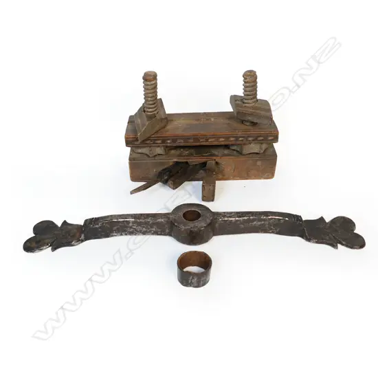 An antique wine barrel latch and old wood plane,