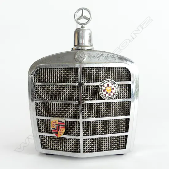 A Mercedes decanter with musical mechanism,