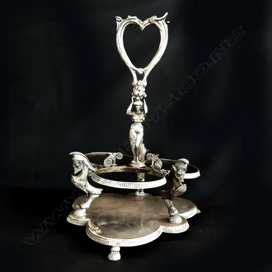 A silver-plated wine carrier,