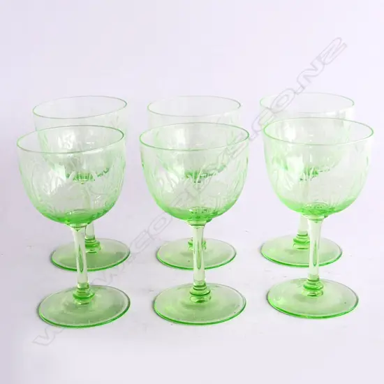 Six green radium glasses,
