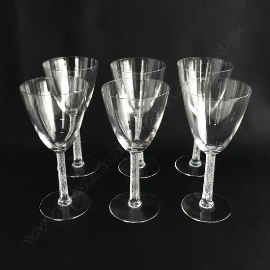 Six medium Lalique wine glasses,
