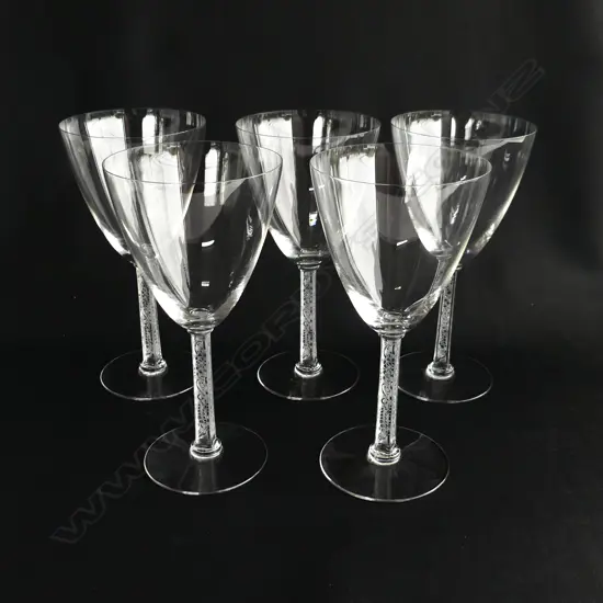 Five large Lalique wine glasses,