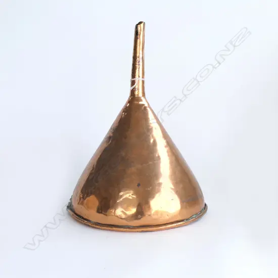 A large copper funnel,