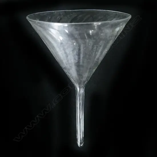 A small glass funnel,