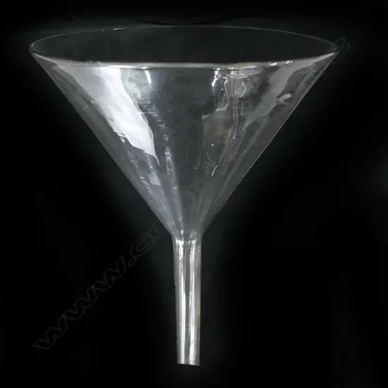 A large glass funnel,