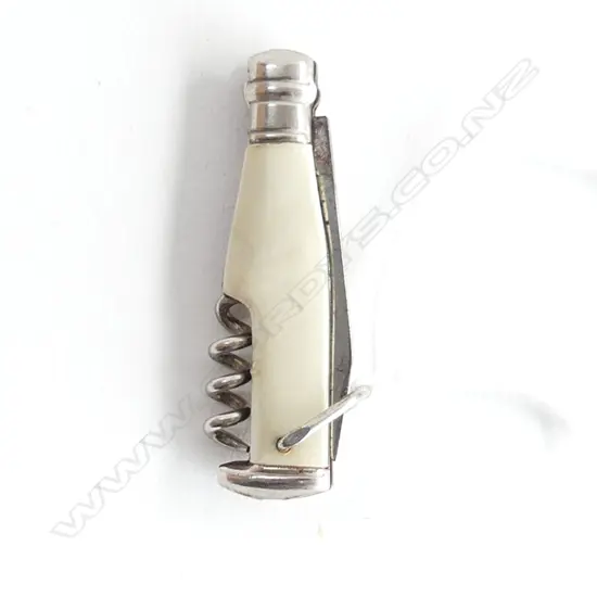 A miniature champagne bottle corkscrew,
