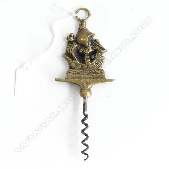 A brass sailing ship corkscrew,