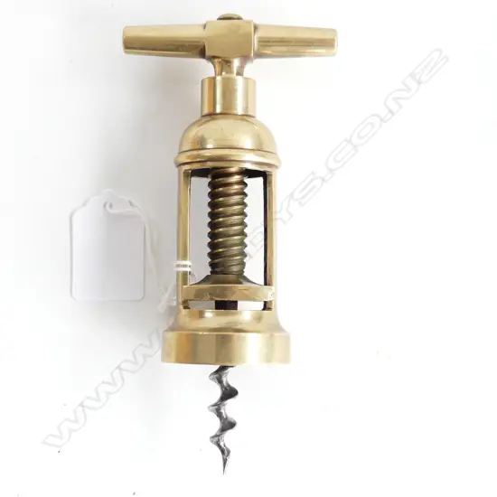 An Italian two-column brass frame corkscrew,