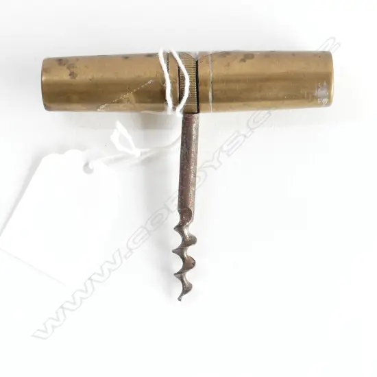 A pre-WWII German-made pocket corkscrew and tool kit,