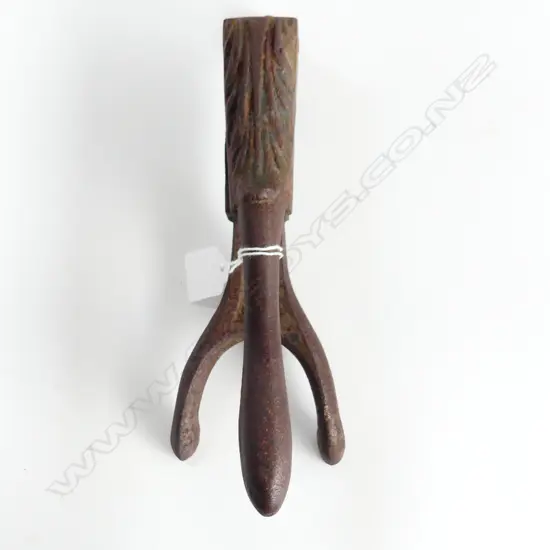 An apothecary cast iron cork press,