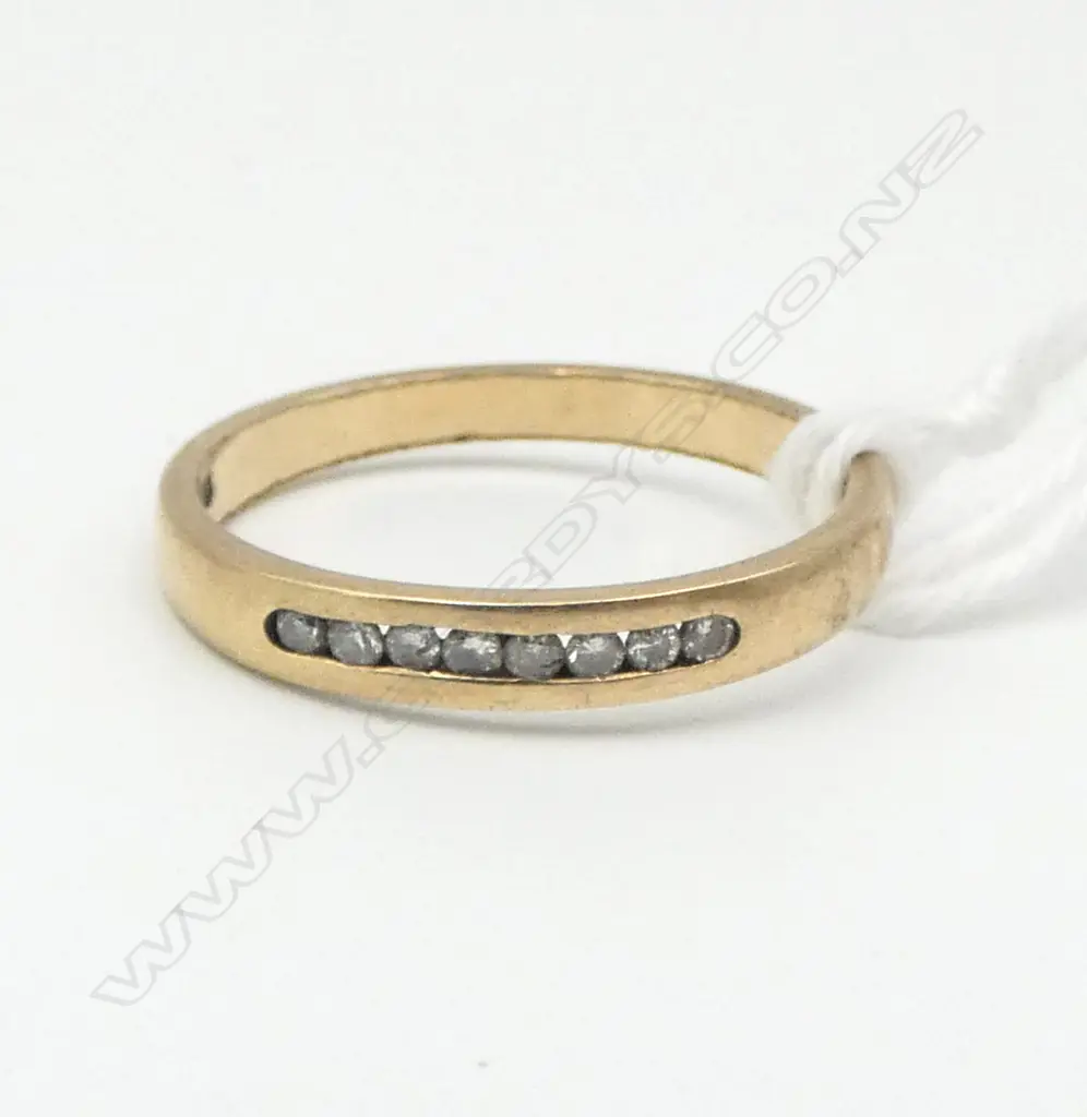 9ct GOLD BAND RING w 8 small channel set diamonds 1.76gms SIZE O Image 1++