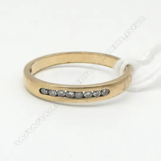 9ct GOLD BAND RING w 8 small channel set diamonds 1.76gms SIZE O