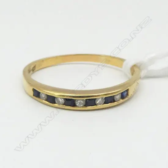18ct Y/GOLD SAPPHIRE & DIAMOND RING channel set alternating stones 2.26gms SIZE Q1/2