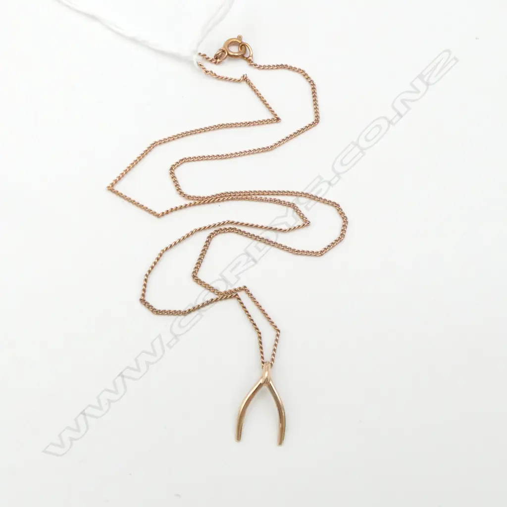 9ct GOLD WISHBONE PENDANT 0.49gms Image 1++
