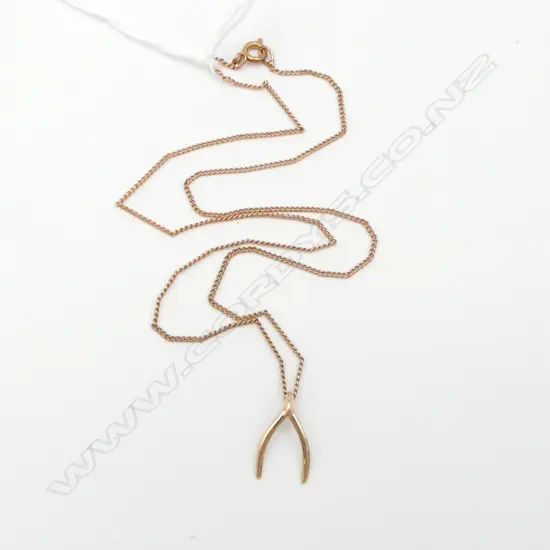 9ct GOLD WISHBONE PENDANT 0.49gms