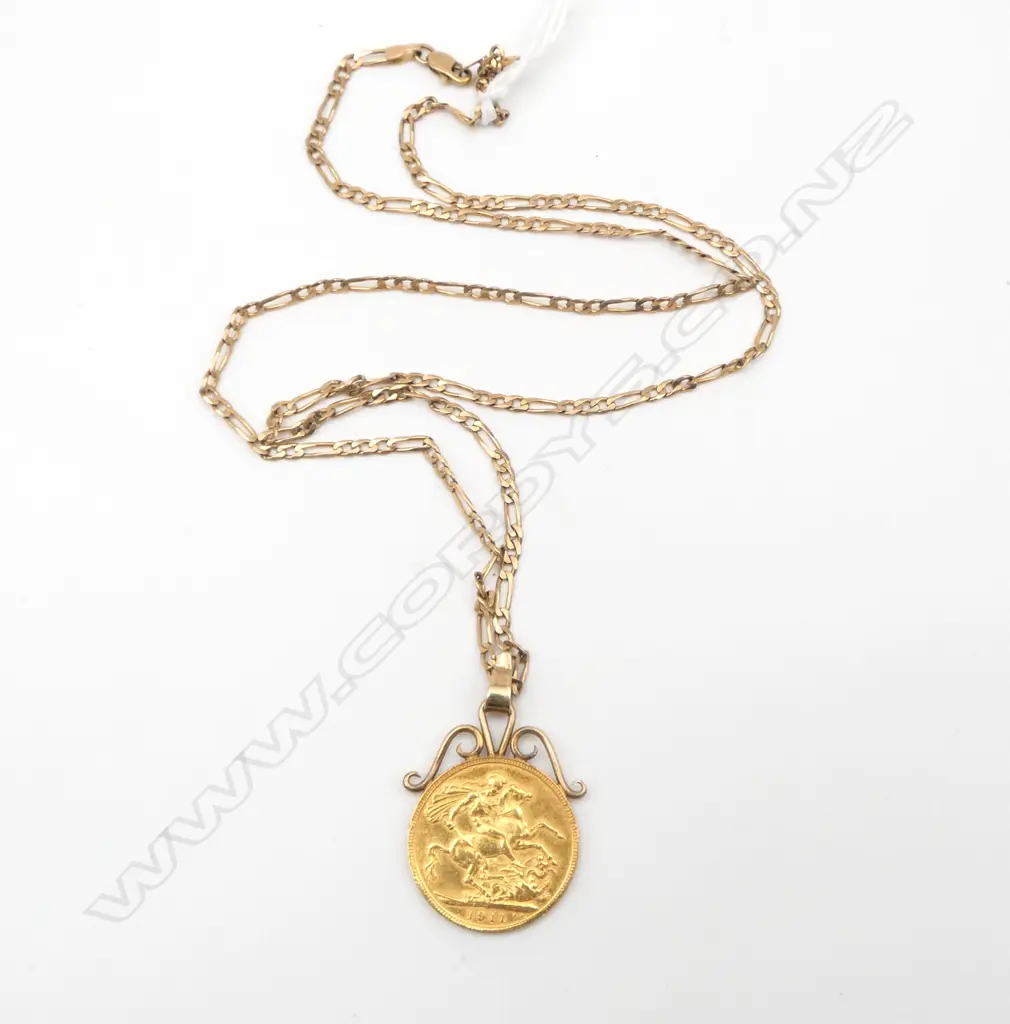 1911 FULL GOLD SOVEREIGN AND 9CT GOLD MOUNT AND CHAIN 5.46gms (chain) Image 1++