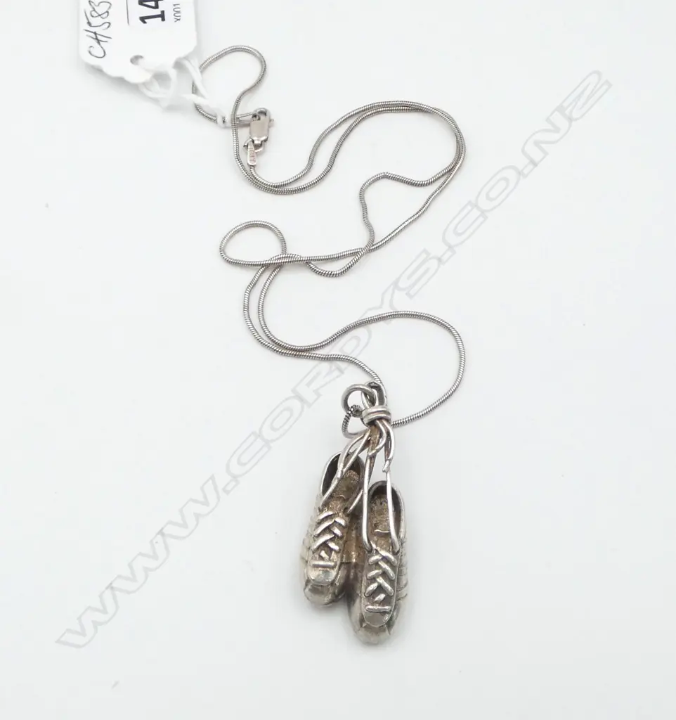SILVER FOOTBALL BOOTS PENDANT on ITALIAN SILVER CHAIN. The looping laces forming the suspension bale Image 1++