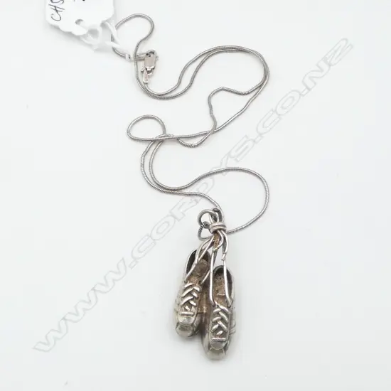 SILVER FOOTBALL BOOTS PENDANT on ITALIAN SILVER CHAIN. The looping laces forming the suspension bale