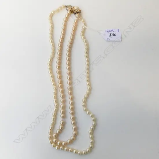 2 COSTUME PEARL NECKLACES. L's.500 & 600MM