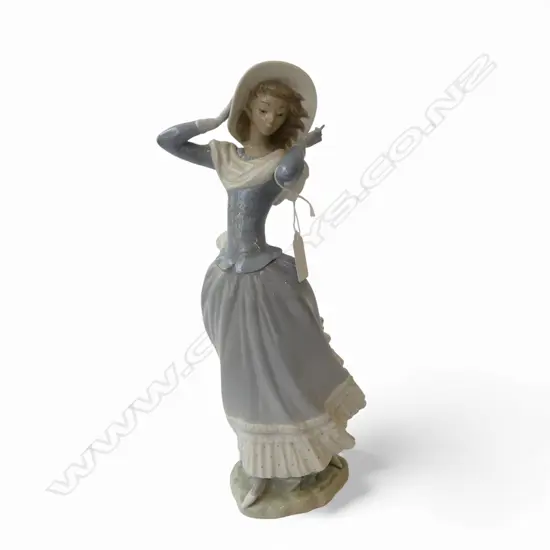 LLADRO FIGURINE 'Spring Breeze', H.350mm, scarf & finger faulted
