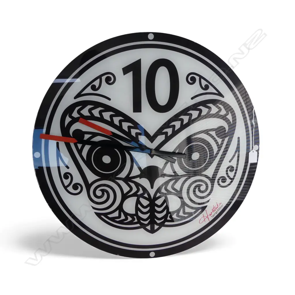 LG WALL CLOCK w. TIKI DESIGN 'HARETUKU TAONGA EDITION' 600mm dia Image 1++