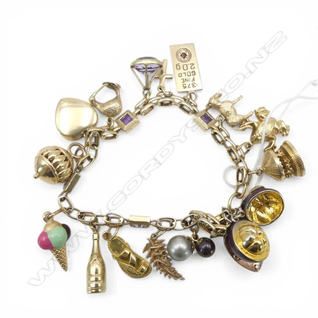 9ct Y/GOLD AMETHYST SET BRACELET w. 13 VARIOS GOLD CHARMS... with valuation 46.5gms Image 1++