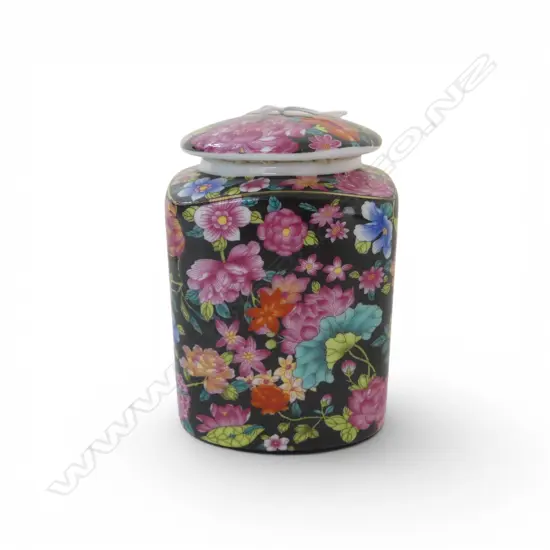 Chinese enamel colored flower-patterned cover jar vivid colours inscription to base. H.115mm