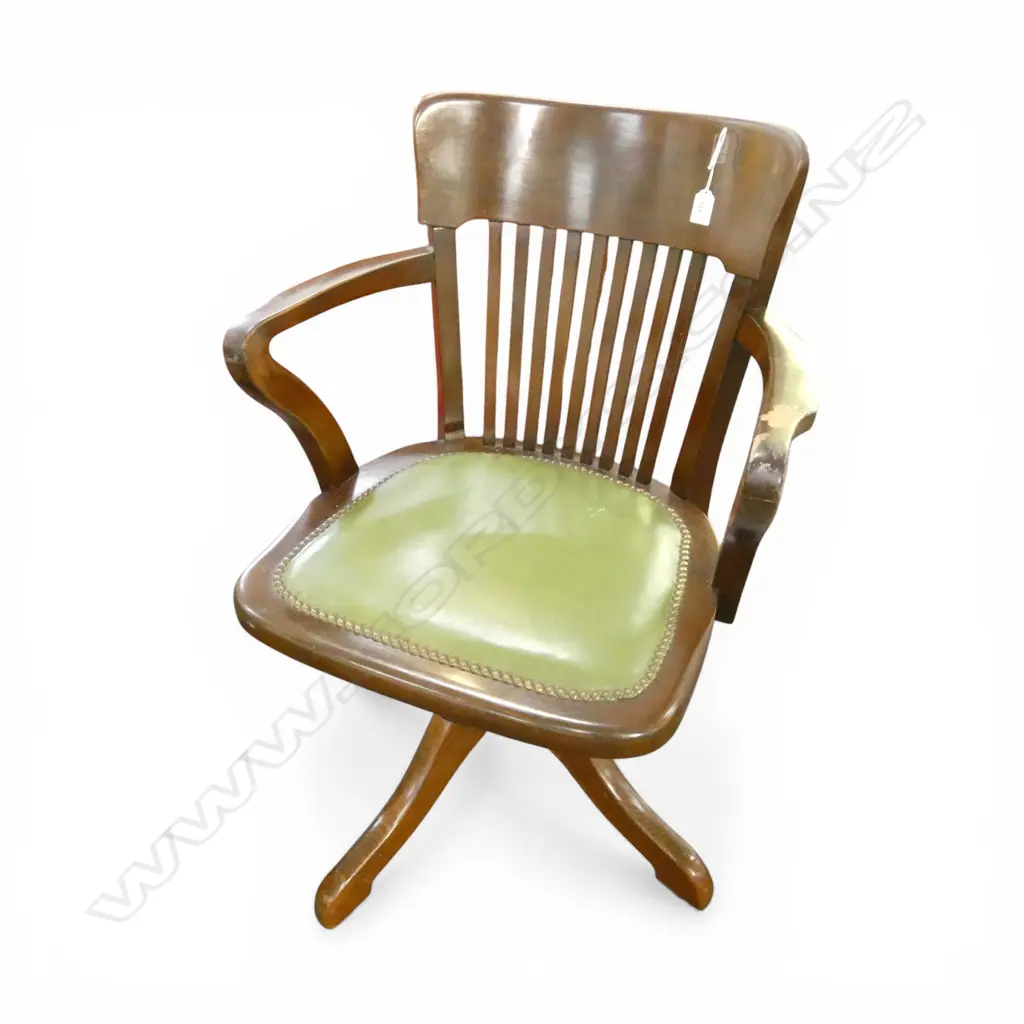 1940's SWIVEL DESK CHAIR slatted back. Green leather upholstered seat. Some varnish wear especially to 1 arm Image 1++