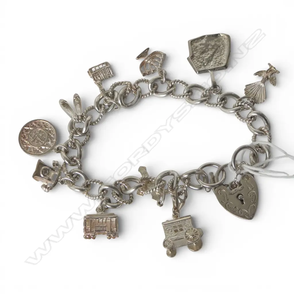 STG SILVER CHARM BRACELET, 36gms Image 1++