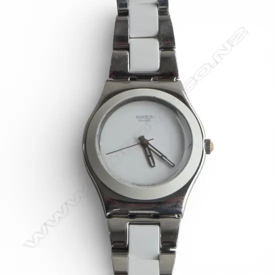 SWATCH DESIGNER DRESS WATCH IN STAINLESS STEEL AND WHITE CERAMIC. GOING WITH NEW BATTERY