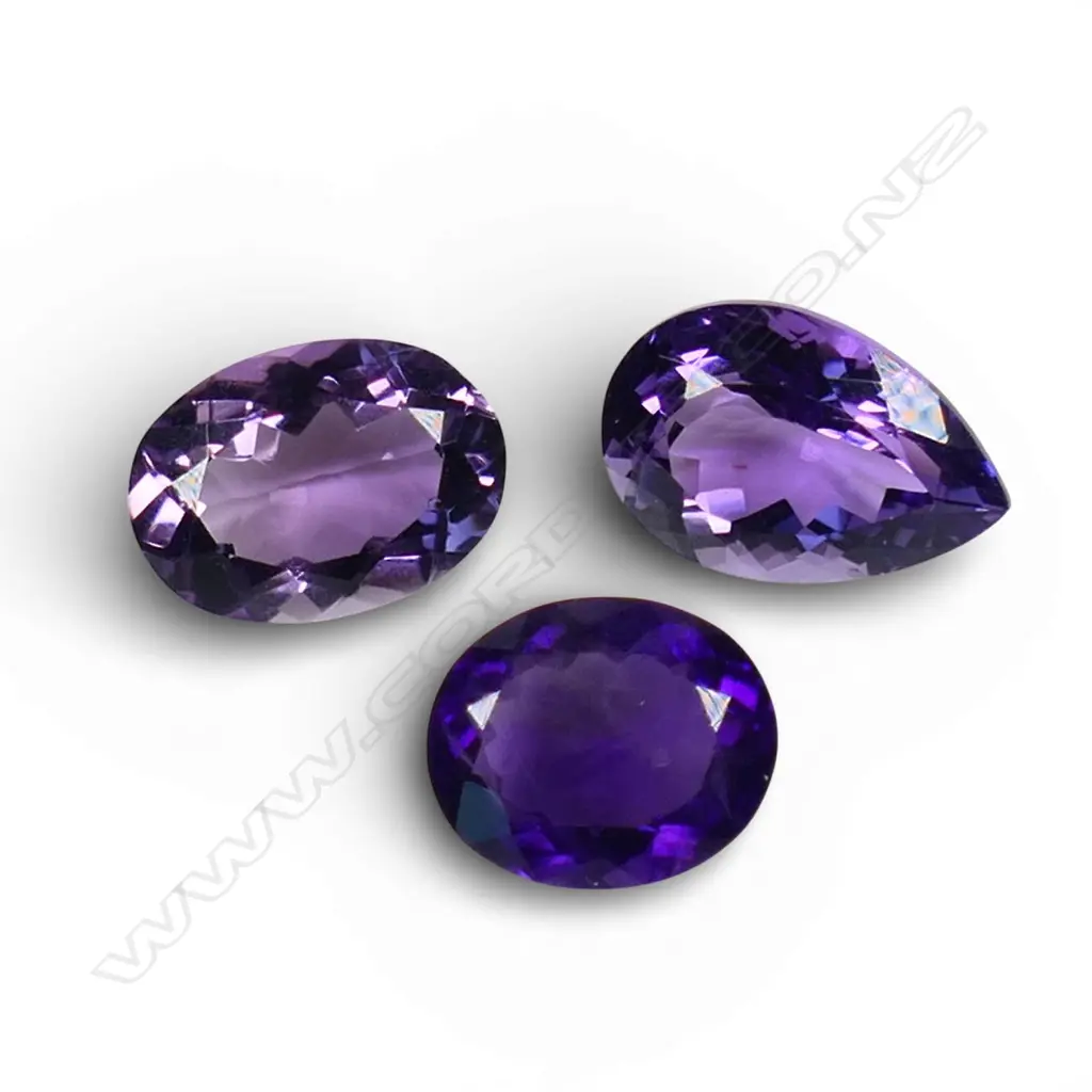 3 LOOSE AMETHYSTS, OVAL & PEAR CUT Image 1++