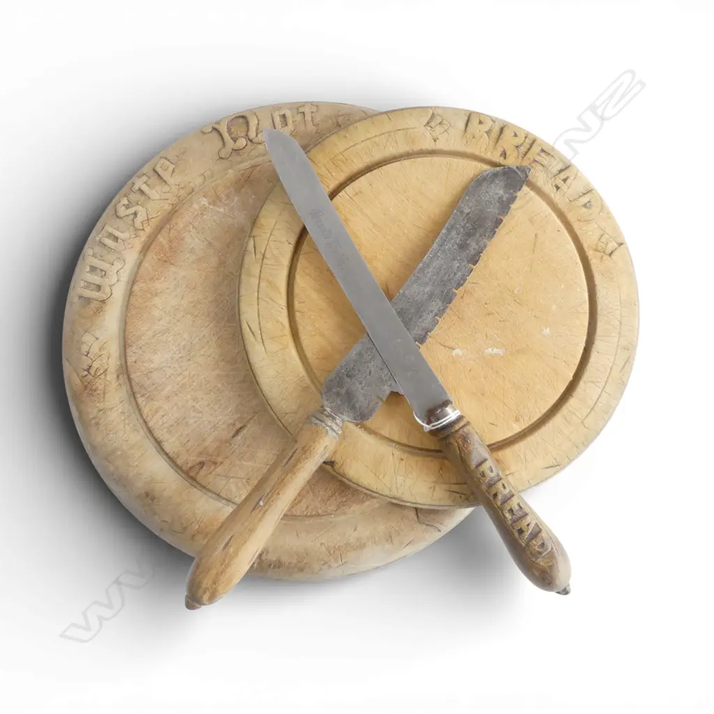 2 VINTAGE CIRCULAR WOODEN BREAD BOARDS with KNIVES carved 'Bread' to handles Image 1++