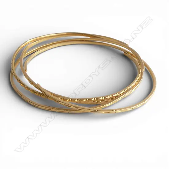 4 x 22ct GOLD BANGLES each cut. Total 36.85gms