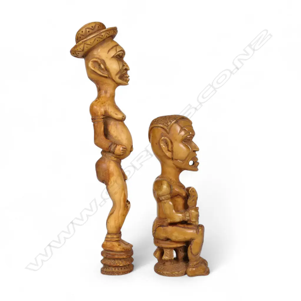 A pair of early 20thC Nigerian carved ivory figures, Image 1++