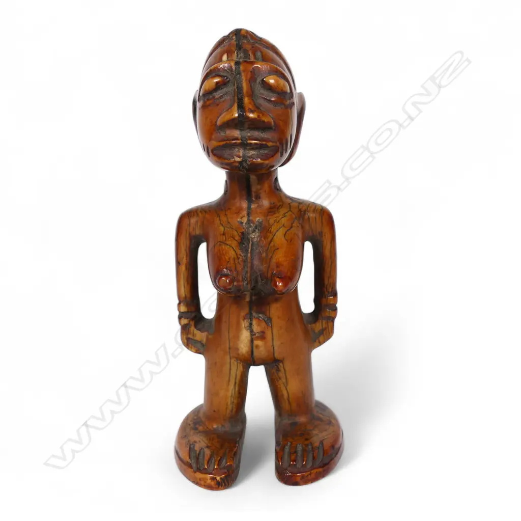An early 20thC Nigerian Ere Ibeji ivory figure, Image 1++