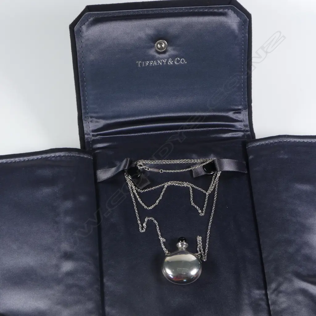 SILVER TIFFANY & CO PERFUME FLASK on SILVER CHAIN, both stamped Tiffany & co, SPAIN, and flask signed Elsa Peretti, case Image 1++