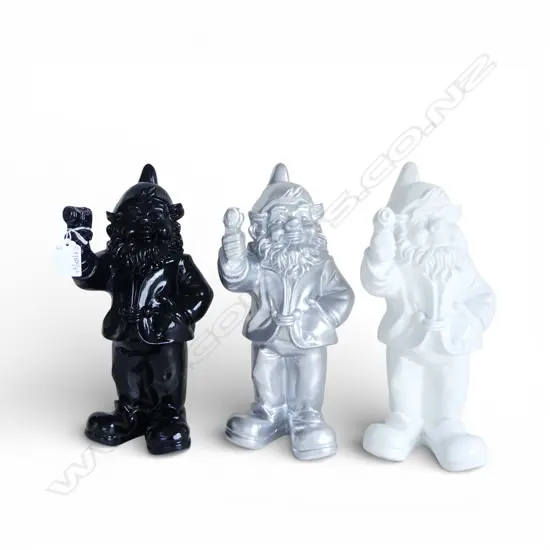 3 RESIN GNOMES HOLDING GUNS; BLACK, WHITE & SILVER H.300mm