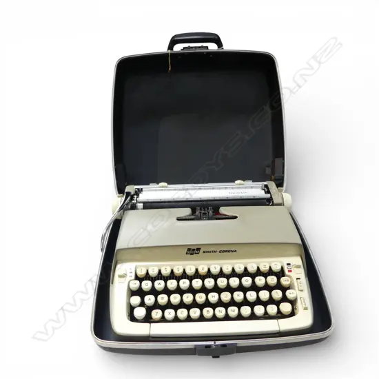 SMITH-CORONA 'GALAXIE' TYPEWRITER IN CASE W.385mm