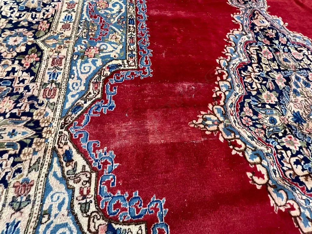 Very large Persian Kerman hand knotted carpet w curvilinear tendril design. Red ground. 5050 x3500mm. Some threads bare Image 1++