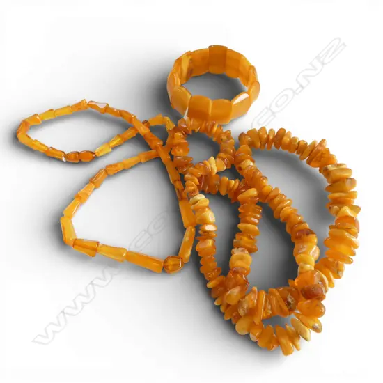 TWO AMBER NECKLACES & A BRACELET From the estate of jeweller Simon Misdale`