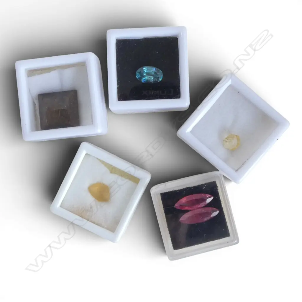 FIVE BOXED FACET CUT GEMSTONES From the estate of Simon Misdale Image 1++