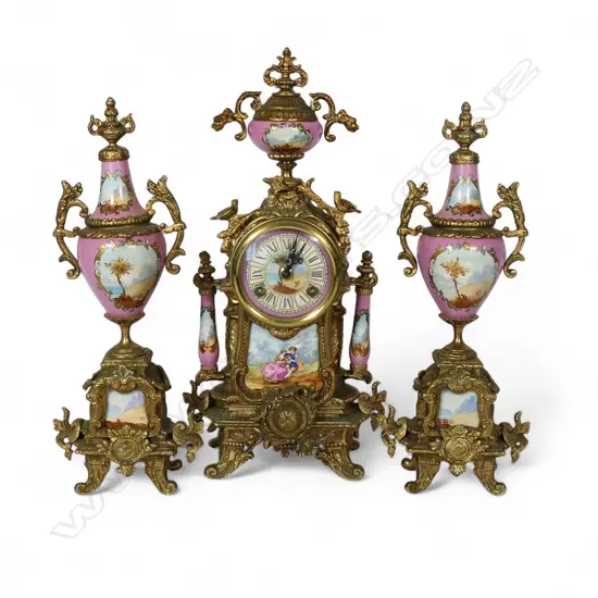 A French antique style 20thC three-piece clock garniture set,