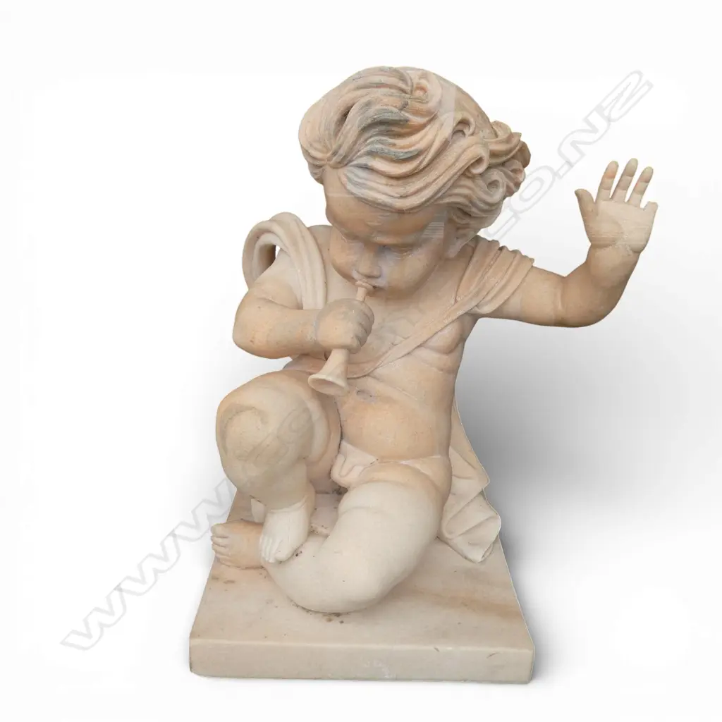 Large carved orange marble statue of a cherub with trumpet, finger damaged. H830mm Image 1++