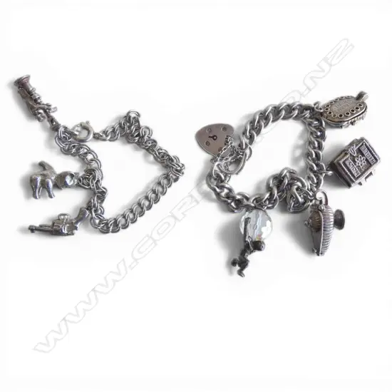 2 SILVER CHARM BRACELETS 54gms