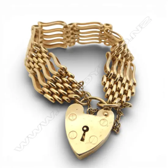 LGE & HEAVY CAST 9ct GOLD GATELINK BRACELET w valuation 38.16gms