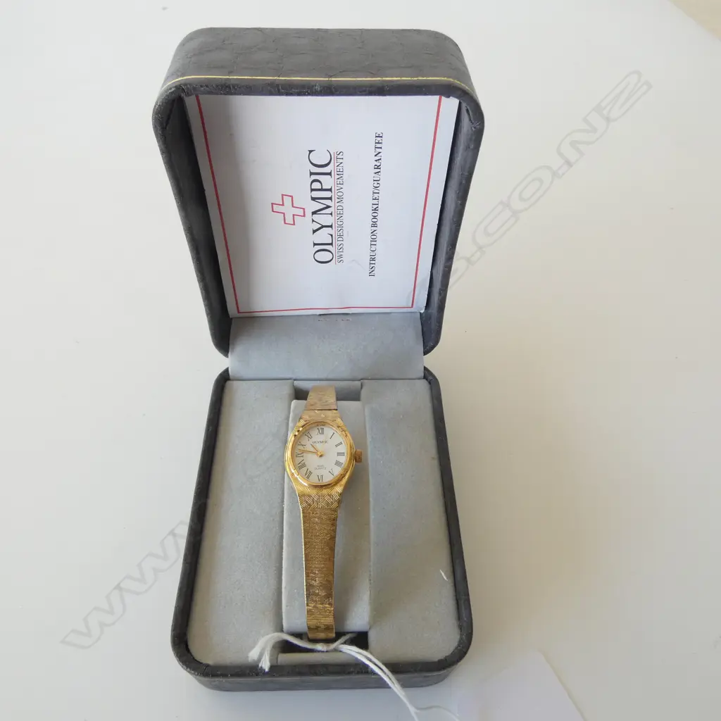 OLYMPIC GP WRIST WATCH, CASED Image 1++