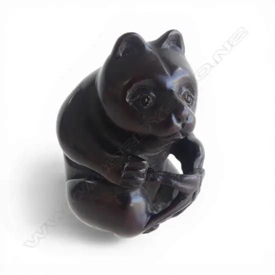 JAPANESE CARVED WOOD NETSUKE OF PANDA WITH LEAF, SIGNED, H.47mm