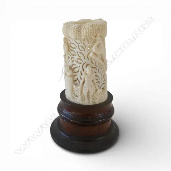 CARVED IVORY TUSK ON WOODEN STAND H.130mm