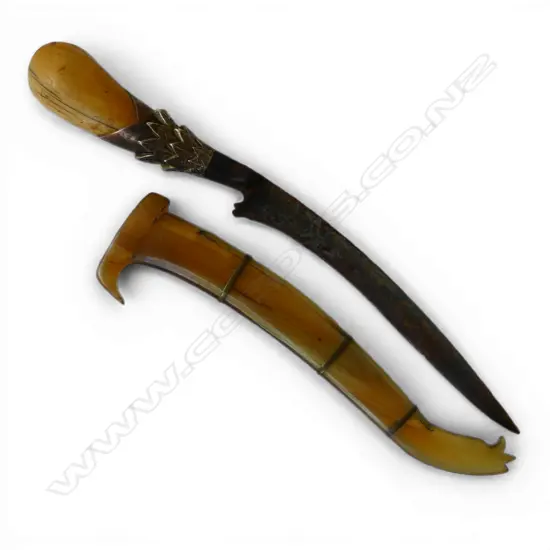 An old Indonesian Sumbawa knife hippo ivory handle silver fitting with loss. Steel blade & horn scabbard. L.250mm.