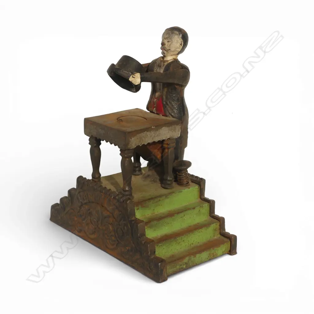 ANTIQUE CAST IRON MECHANICAL 'MAGICIAN BANK' MONEY BANK missing bottom coin plate H.200mm Image 1++